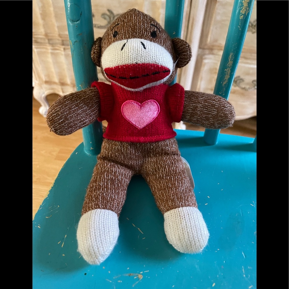 Sock Monkey in good condition ,a girl in another ad!